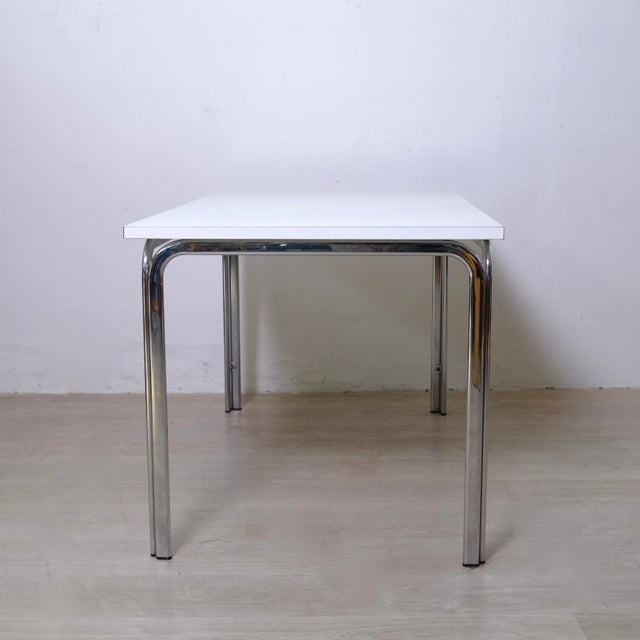 Splendid original rectangular table from the 1970s and 1980s, perfect as a dining table or office desk. A classic of...