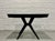 Atomic Mid Century Modern Ebonized Dining Table, c. 1950’s. Loads of delicious design features, from its amazing spider...