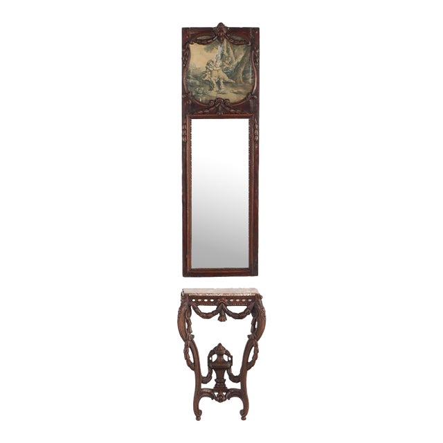 A 19th Century French Carved Walnut Console Table With Conforming Trumeau Mirror. For Sale