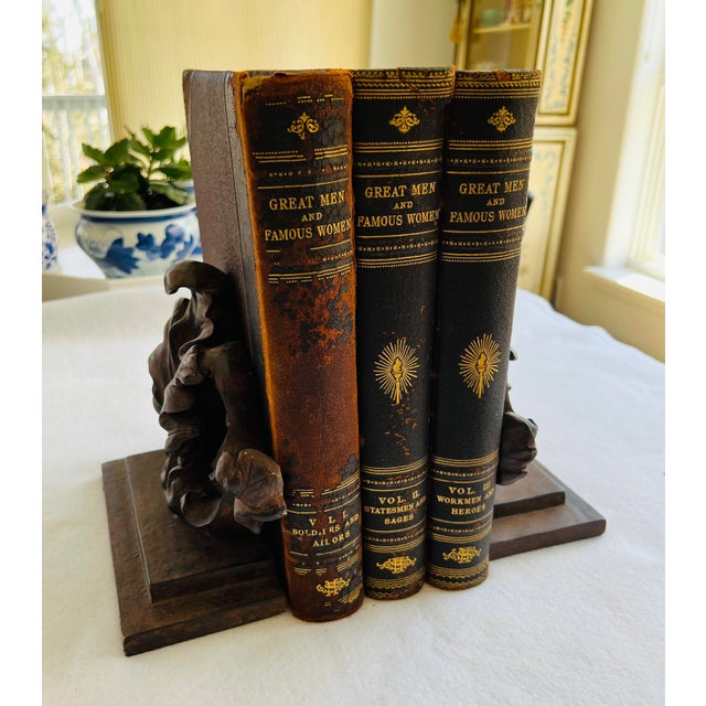 A wonderful pair of Fleur de lis-styled bookends designed to support very large books - a necessary addition to any...