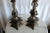 Magnificent pair of French candelabra lamps now turned electric, each one featuring 5 arms above an ornate marble urn...