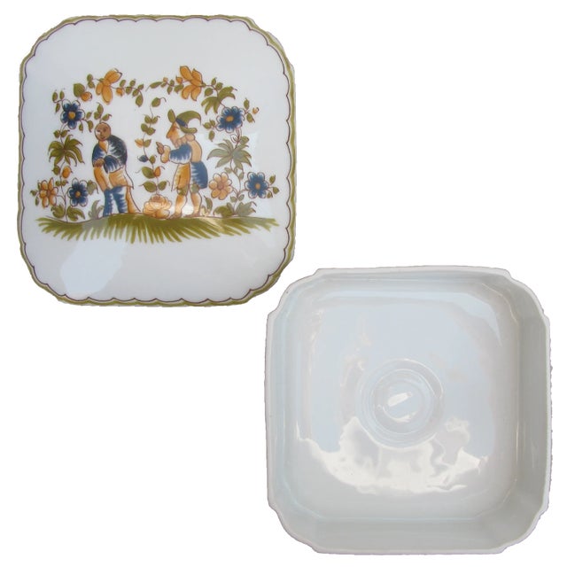 Lovely Limoges porcelain box with charming hand-painted design similar in style to Henriot Quimper ware. Convex lid on...