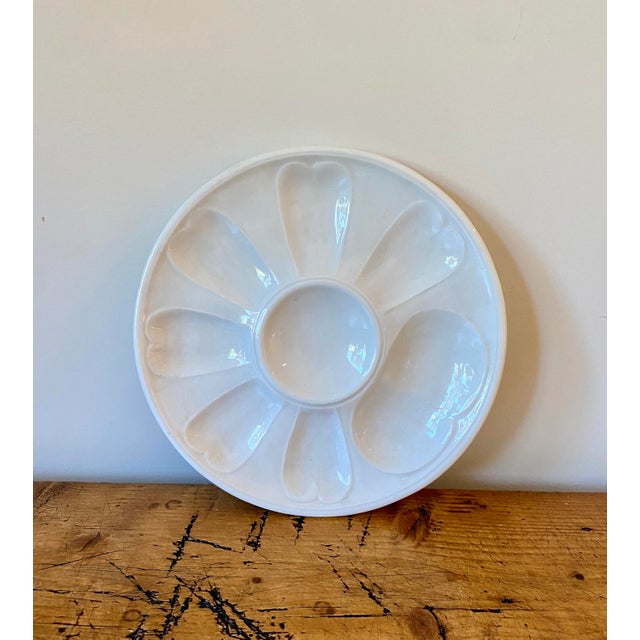 Set of 7, White Ceramic Oyster Plates - Made in Italy. There are 6 oyster wells and 1 condiment well.