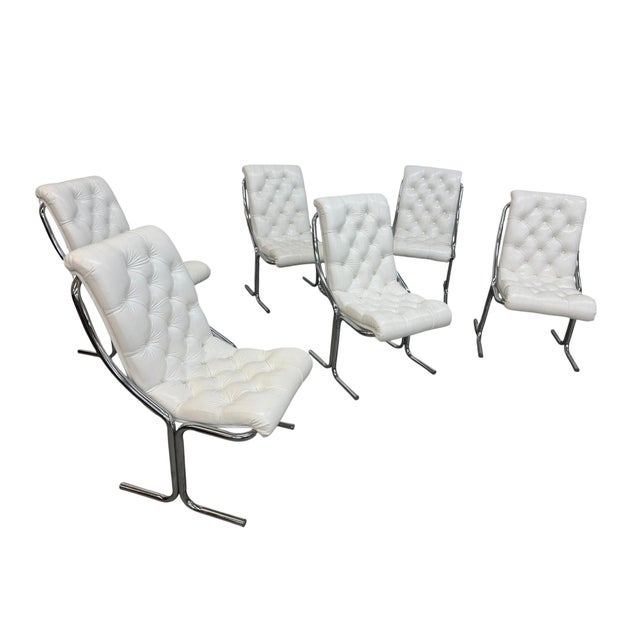 Bring iconic 1970s style to your dining room with this exceptional set of Mid-Century Modern Daystrom chrome tubular...