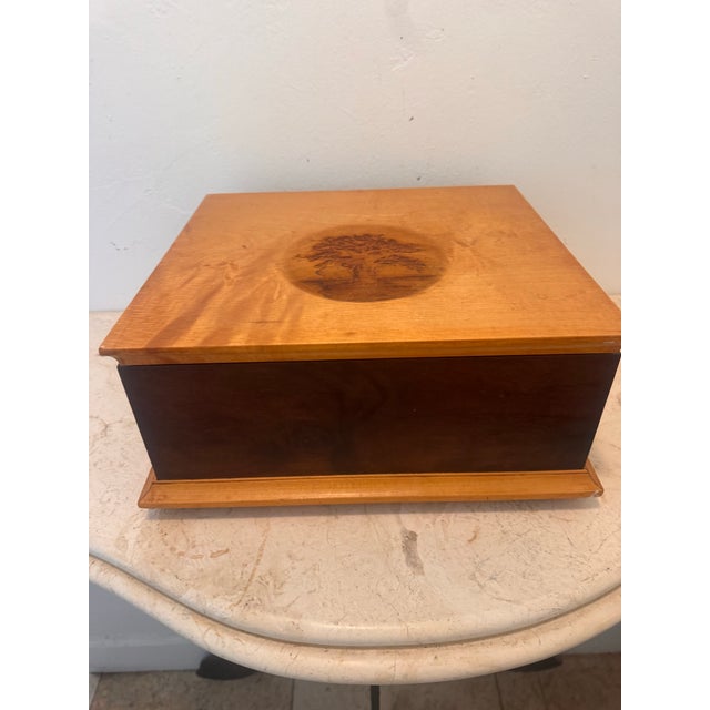 Beautiful handmade heritage box by David Whitaker for “Under the Baobab,” dated 2005. Crafted with contrasting figured...