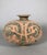 Cocoon vase in polychrome terracotta, Early Han Dynasty (206 BC - 220 AD). Polychrome painted terracotta with archaic...