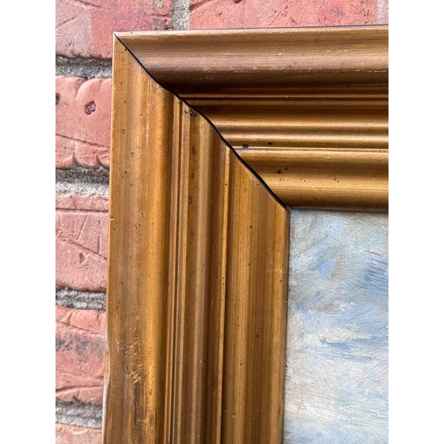 This is an early 19th Century countryside landscape oil painting in a gold-colored frame, The composition features a rural...