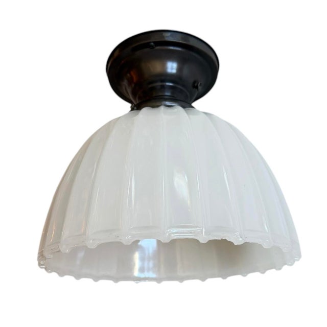This will look great with any style of architecture. A classic Jefferson style moonstone glass light fixture that gives...