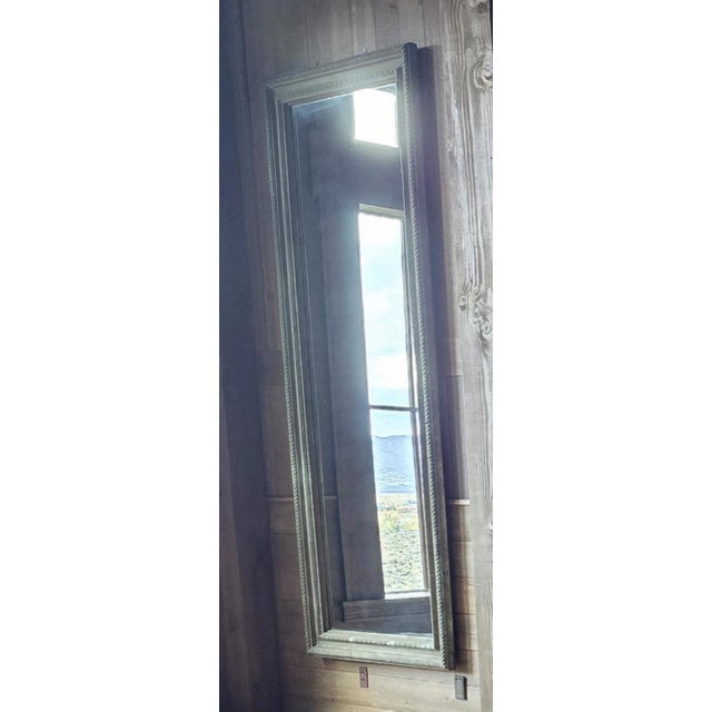 verdegris copper molding surrounds new mirror. purchased from a dealer in San Francisco 25 years ago.