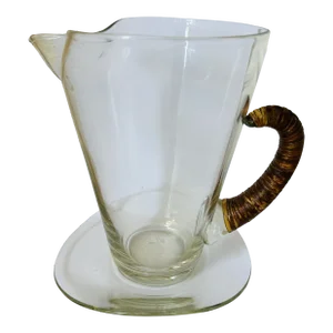 Vintage Carl Aubock Style Pitcher With Rattan Wrapped Handle and Attached Underplate