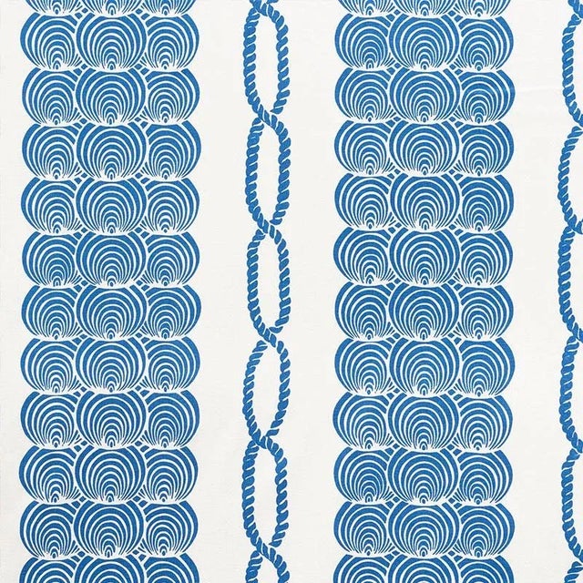This stylish scallop pattern with twisted rope borders is screen-printed on a crisp cotton ground. Also available as a...
