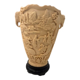 Pair of Carved Composite Elephant Vases on Black Bases For Sale