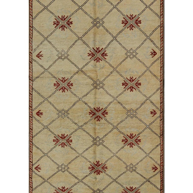 Vintage Turkish Cross-Hatch Trellis Design Oushak Rug by Keivan Woven Arts Measures: 4'2 x 9'7 This 1940's Turkish Oushak...