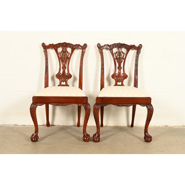 An outstanding pair of Chippendale or Georgian style side chairs or dining chairs In the manner of Baker Furniture USA,...