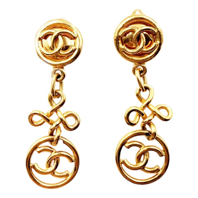 Chanel Vintage Gold Plated Round CC Twisted Cross Long Clip on Earrings, A Pair For Sale