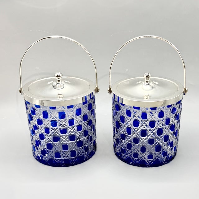 Pair of Vintage Cobalt Blue Overlay Cut Crystal Biscuit Barrels with Silver-Plated Mounts. A striking pair of vintage cut...