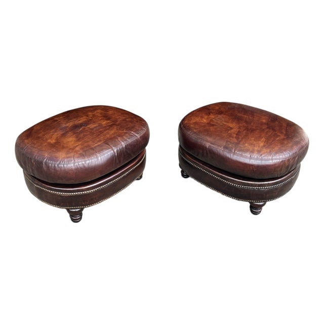 Vintage Oval Brown Leather Ottomans With Brass Nailhead Trim – A Pair For Sale