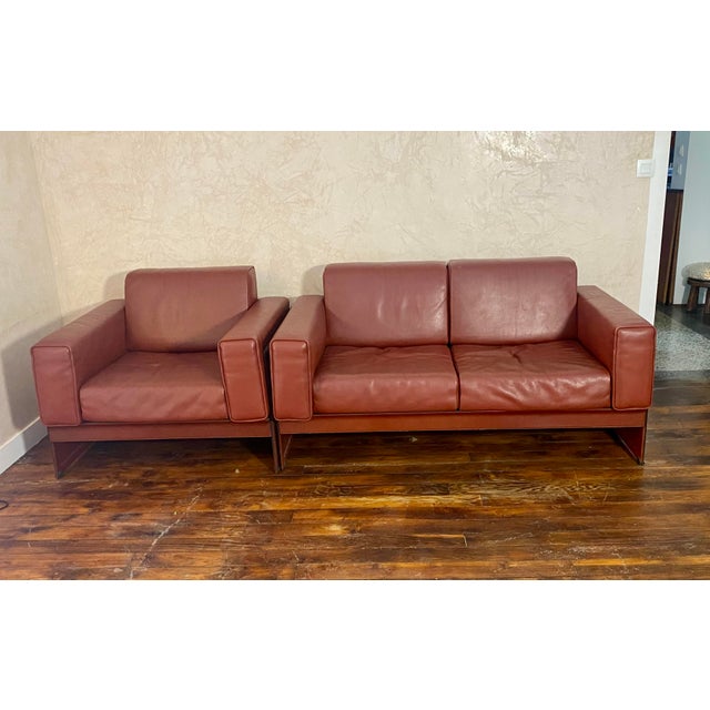 A two-seater sofa and an elegant armchair designed in the 1970s by renowned Italian designer Tito Agnoli for Matteo...