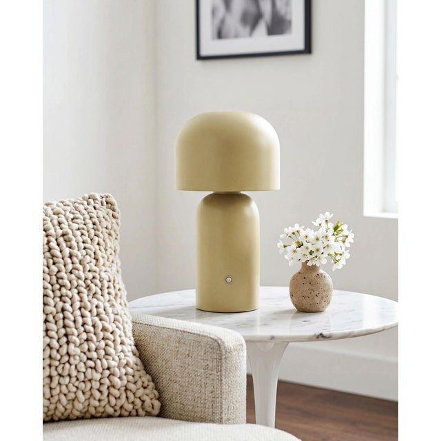 Illuminate your space with the Umbra accent table lamp, a beacon of minimalist modern style. Standing at a sleek 10 inches...