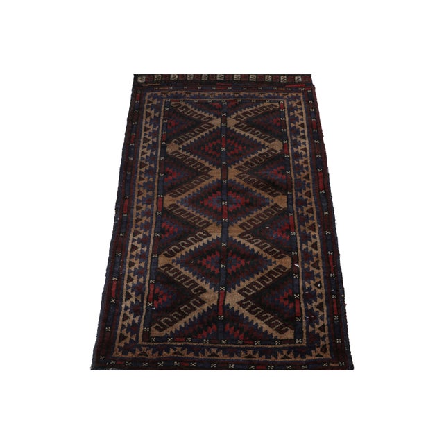 Hand knotted in wool, this 2x4 Baluch rug represents a new line of tribal carpets in the Modern Classics Collection by Rug...