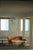 A beautiful and characterful Danish three-seater sofa from the 1960s, featuring an elegant curved silhouette and warm...