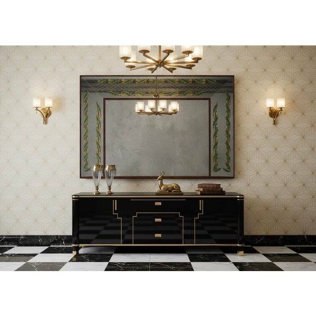 Very elegant mirror by Luigi Brusotti, original and one-of-a-kind design, with internal electrification. The mirror has a...