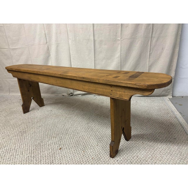 This 19th century English pine bench is a fine example of honest country craftsmanship—unadorned, well-built, and full of...