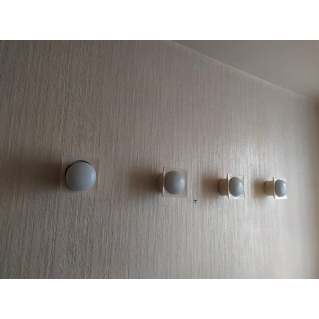 Vintage Wall Lights from Raak, 1970s, Set of 4, in Good conditions. Designed 1970 to 1979 This piece has an attribution...