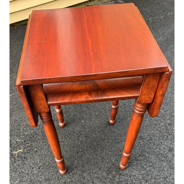 Nice Federal period cherry and flame mahogany dropleaf work table with 1 drawer. The hand dovetailed drawer has beautiful...