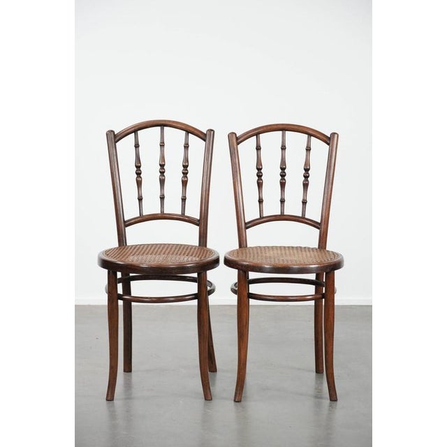 We are offering this beautiful set of 6 wooden vintage bistro chairs by Jacob & Josef Kohn Wien with wicker seats. This...