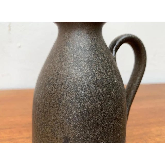Mid-Century German Brutalist Carafe Vase in the style of Gerhard Liebenthron, 1960s, in None conditions. Designed 1960 to...