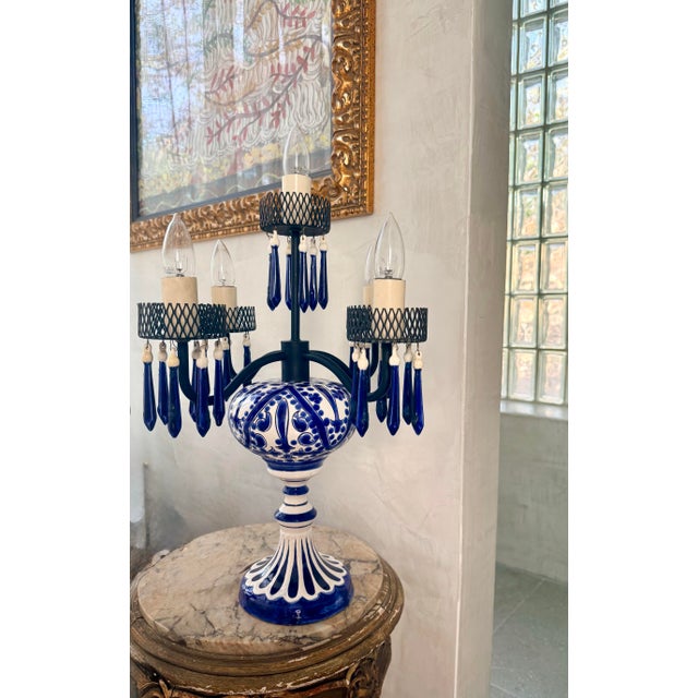 One-of-a-Kind Vintage Delft-Style Blue Hand-Painted Floral Motifs on White Porcelain Table Lamp With 5 Arms. The base...