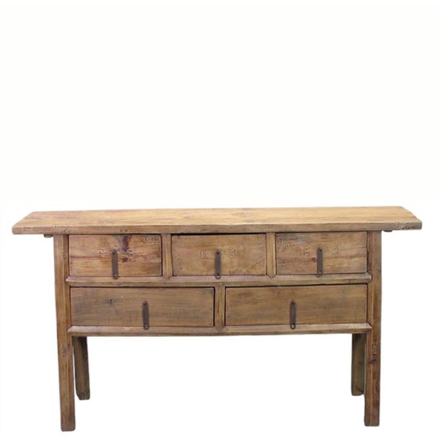 This 19th century console table, made from polarwood, features a 5 drawer configuration with 3 small upper drawers over 2...