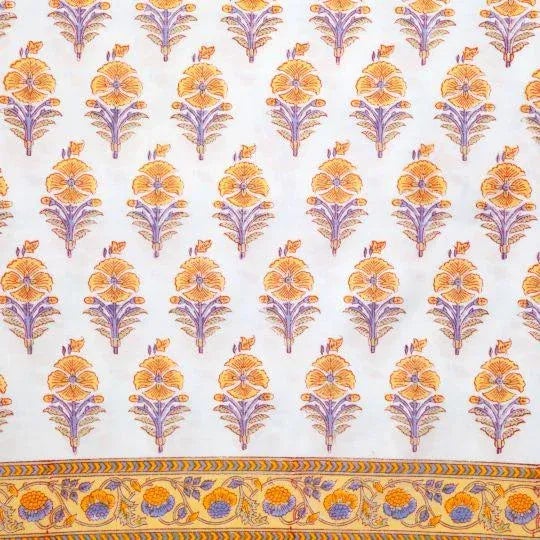 The Juhi flower design depicts a typical Indian flower motif in warm yellow tones with accents in cool periwinkle. This...