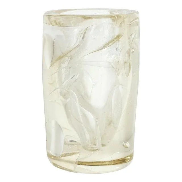 Small, gold-flecked art glass vase with internal swirl motif. Signed. Made in the 1980s.