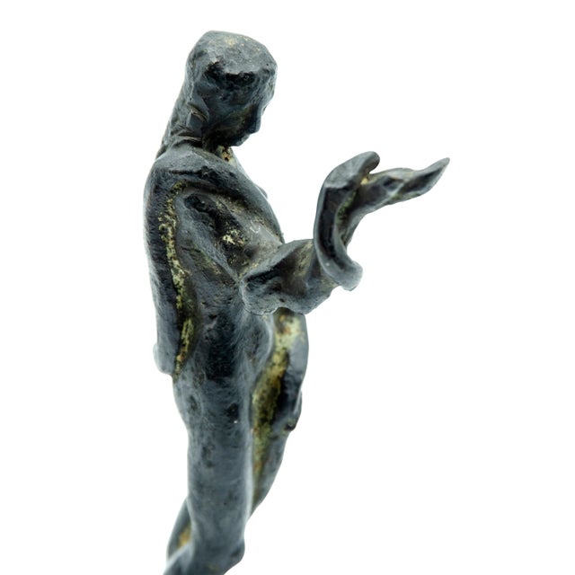 Adam and Eve standing, Eve with a snake wrapped around her arm and Adam posed with his fist on his head. Signed on base....