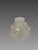 Vase signed René Lalique (1860-1945), "Sunflower" model, 1927. "Sunflower" model vase in slightly opalescent white pressed...