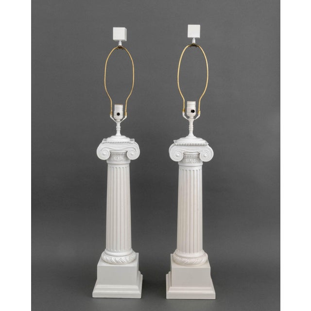 Pair of Neoclassical Style White Painted Ionic Column Form Table Lamps, each with cube finial. 40.5" H x 7.25" W x 7.25"...