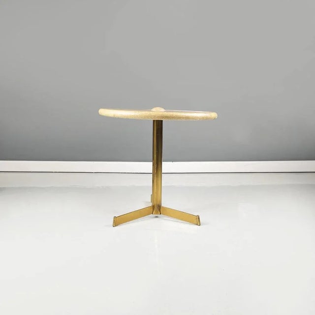 Italian Mid-Century Modern Coffee table in wood, parchment and brass by Aldo Tura, 1960s Coffee table with round wooden...