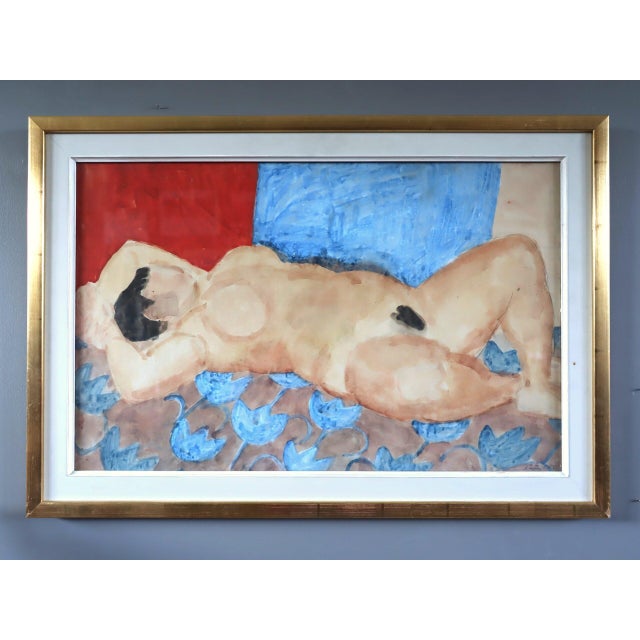 RECLINING FIGURE ON RUG Size: 18.9 x 27.2 inches (including frame) Watercolour on paper A striking mid-century figurative...