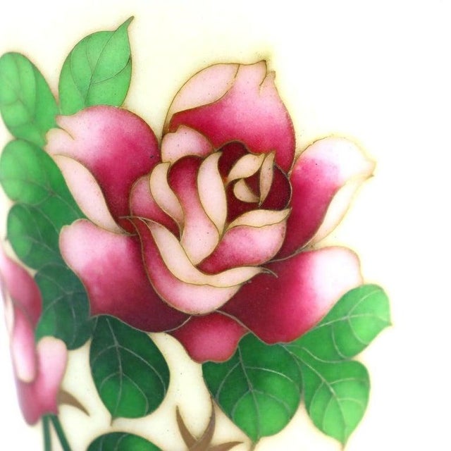 An antique Japanese cloisonné enamel vase, attributed to the renowned Ando Cloisonne Company, dating to circa 1920. This...