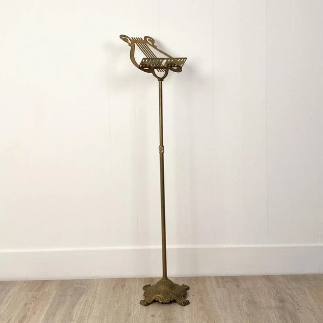 A Victorian brass music stand, late 19th century, England.