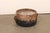 A Guatemalan large earthenware cooking vessel from the early 20th century. This antique pot from Guatemala has a hand-...