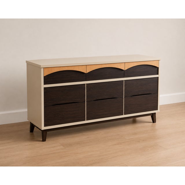 This vintage dresser has been professionally restored and refinished while preserving its beautiful mid-century lines. The...