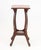 Aesthetic Movement Mahogany Side Table, with square top above carved mask head aprons on pierced spindle curved legs...