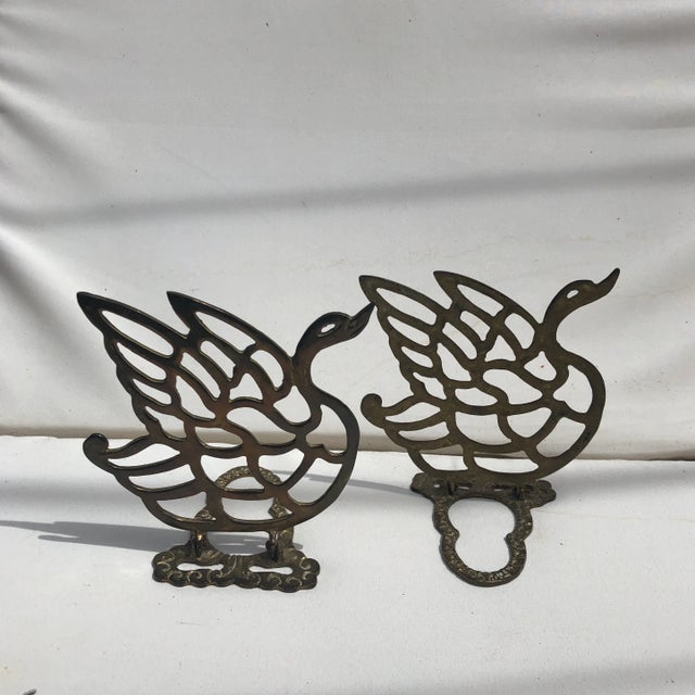 Pair of elegantly cut out swan brass bookends. Great bookend accents for the MCM decorator. Must have for swan collector.