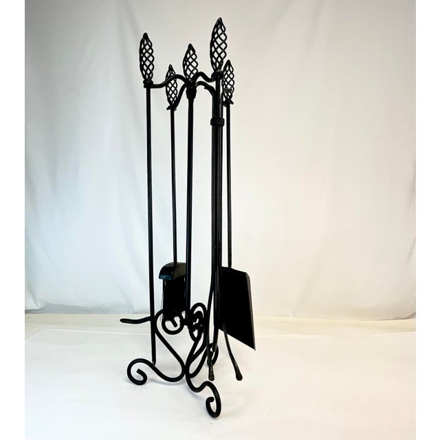 This is a beautifully styled Fireplace Tool Set from the 1970s. Crafted of hand forged wrought iron, the set features...