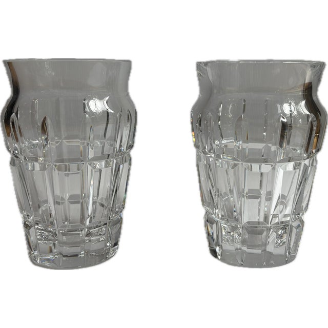 An exquisite, matched pair of vintage clear lead crystal vases by legendary French maker Baccarat. Substantial and...