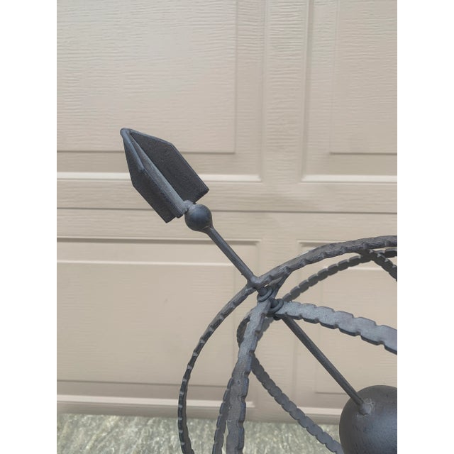 A beautifully crafted iron armillary sphere, evoking the timeless elegance of classical European gardens. Pieces like this...