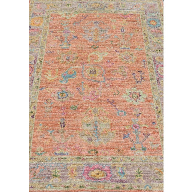 Shabby Chic Hand Knotted Turkish Floral Oushak With Orange Background and Lilac Border 4'0 X 6'0 For Sale - Image 3 of 11